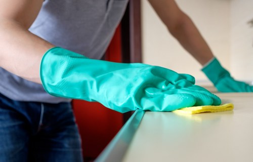 A carpet cleaner working on a stained carpet in Fulham